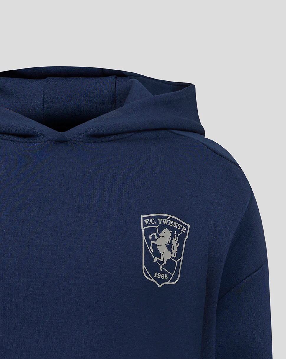 FC TWENTE TRAVEL OVERHEAD HOODY 25/26 - JUNIOR